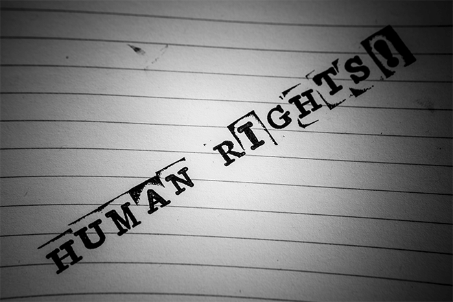 human rights written on paper