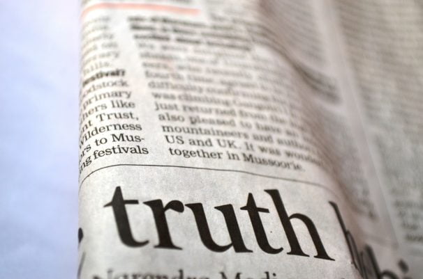 truth text on newspaper