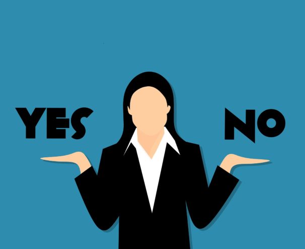 person shruggin with yes or no in each hand