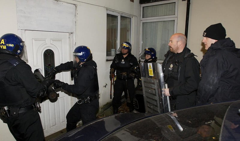 raid police breaking down door