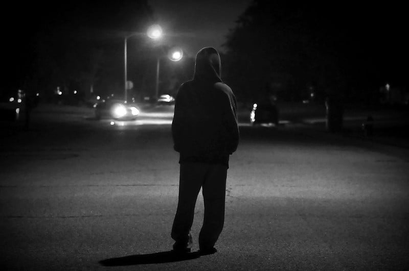 person in hoodie in the street